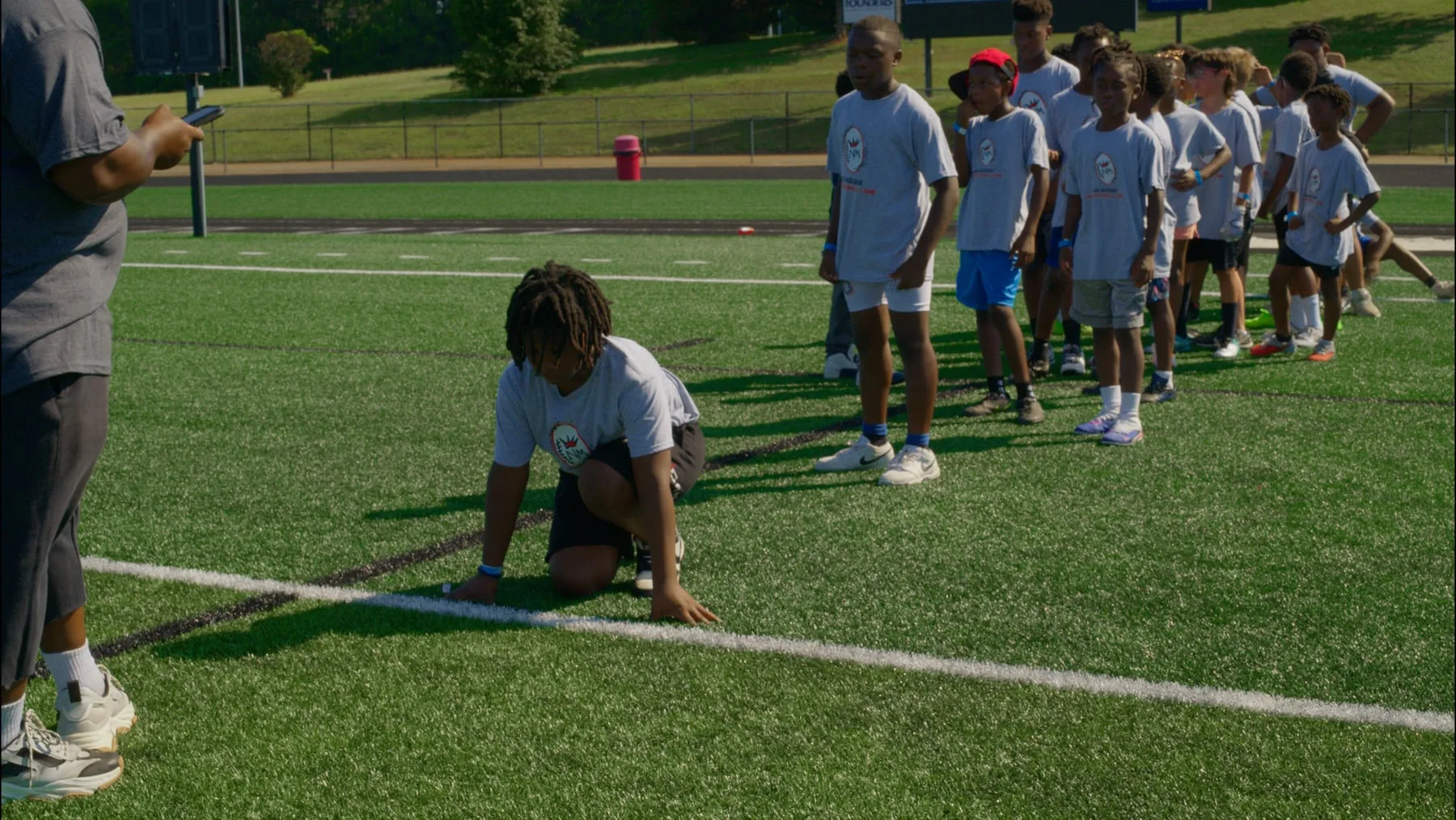 F.A.S.T. athlete in a sprint start on the field